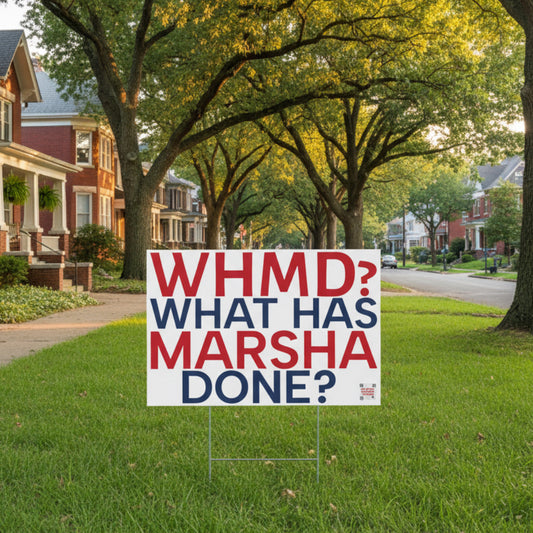 Political protest sign with text 'WHMD? WHAT HAS MARSHA DONE?' on a white background on a tree-lined street in a historic neighborhood